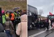 A passenger bus stopped at the border