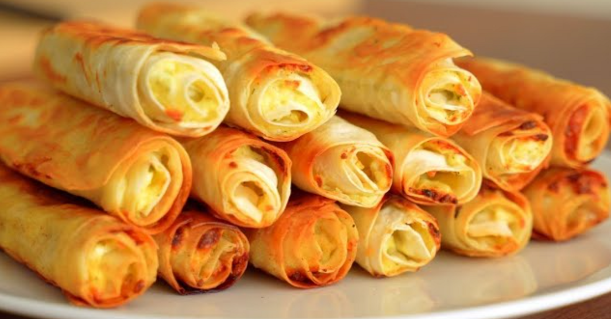 Pita tubes with potatoes in 20 minutes: how to cook an elementary dish