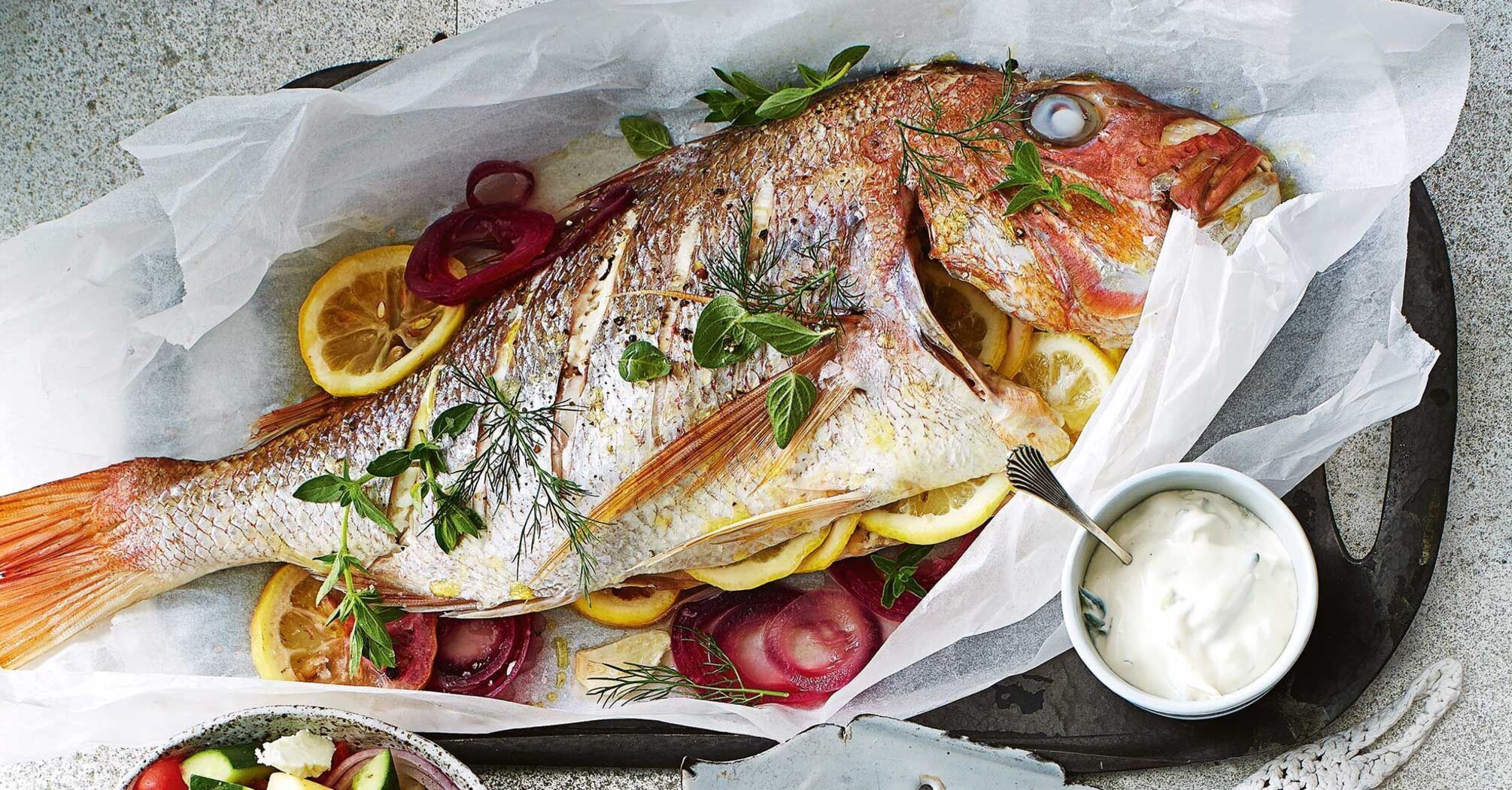 The most delicious baked fish in the oven: what vegetables and spices to add