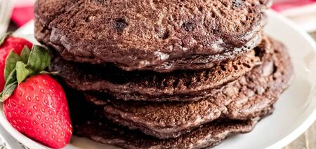 Healthy chocolate oatmeal pancake for breakfast: made without flour and sugar