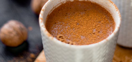 Delicious coffee with cinnamon