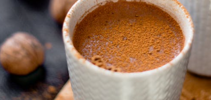 Delicious coffee with cinnamon