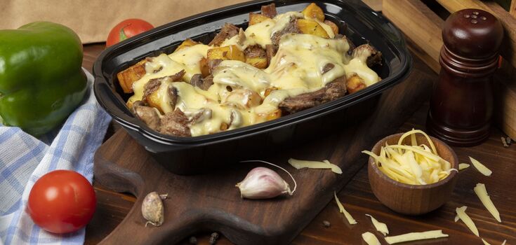 The most delicate side dish: potatoes with mushrooms in cream for lunch