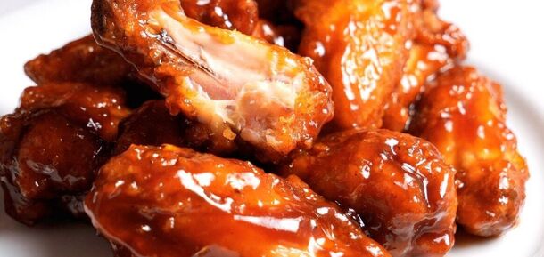 How to cook juicy BBQ wings in a frying pan: the most successful way