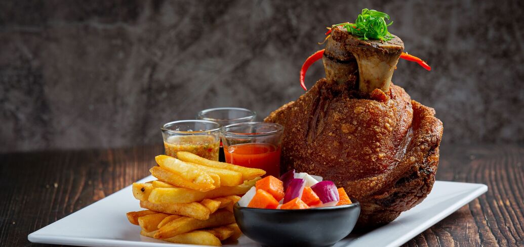Boar's knee in beer with honey: an ideal alternative to store-bought sausage