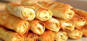 Pita tubes with cheese: how to cook an elementary dish in 20 minutes