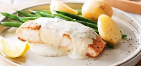 How to deliciously bake hake in the oven for lunch: it will be very tender and juicy