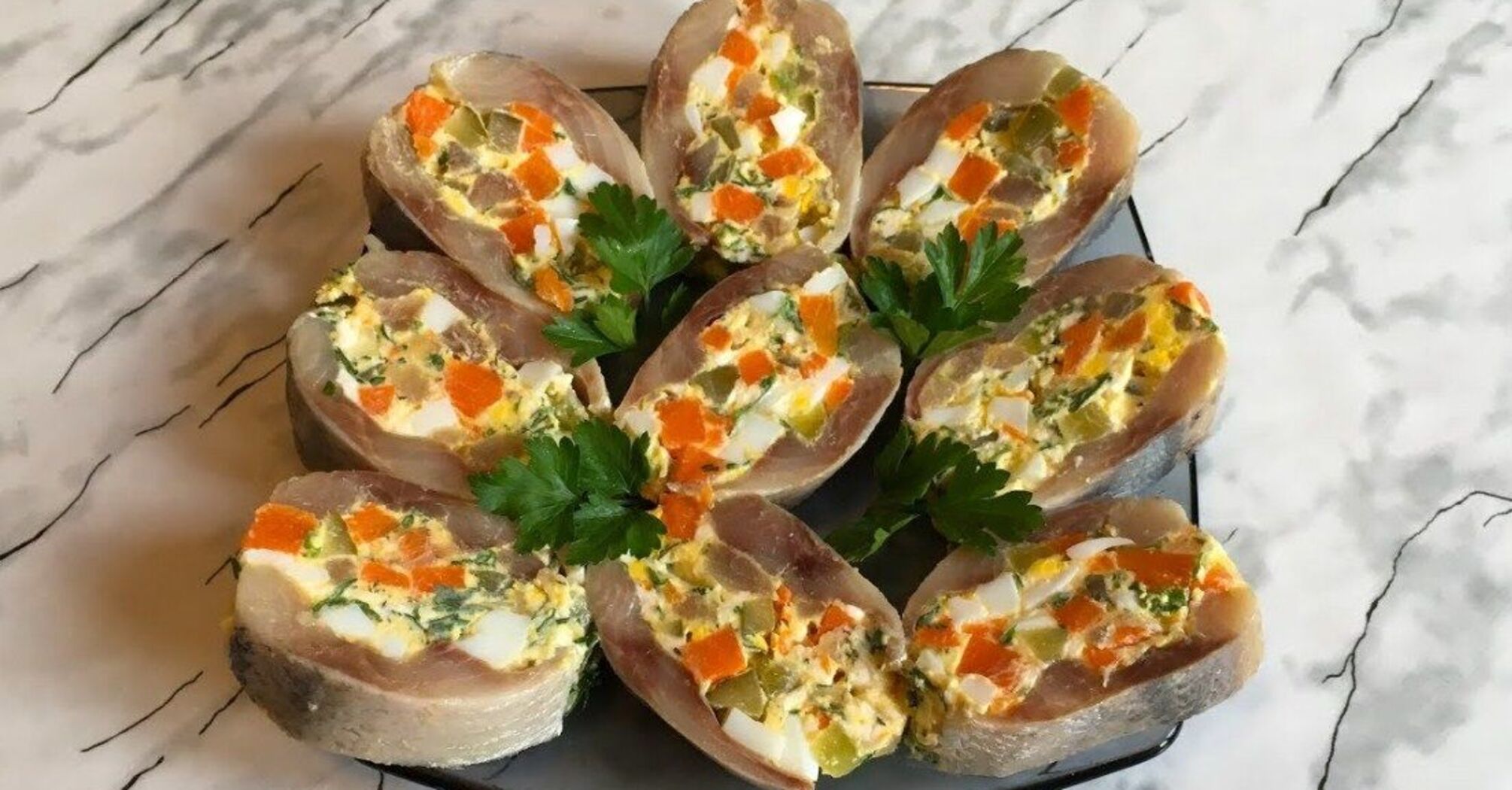 Herring stuffed with processed cheese: a budget appetizer for all occasions