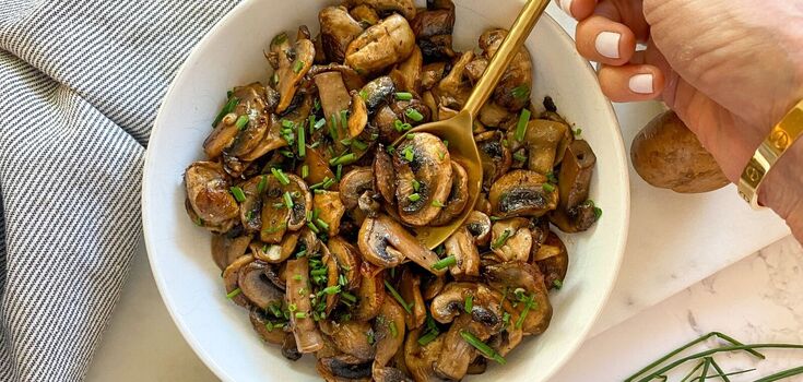 Delicious mushrooms with garlic in a skillet: cooked for 15 minutes