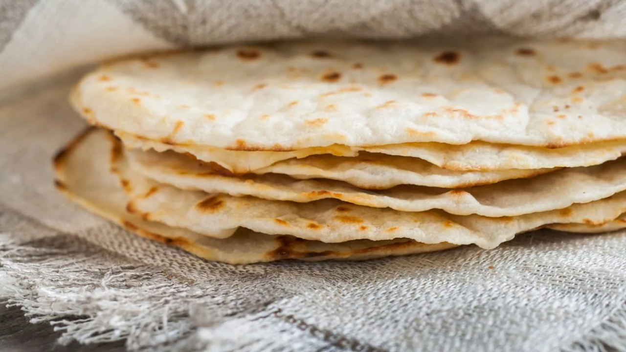 Homemade thin pita bread on water: fried in a pan