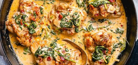 Juicy chicken fillet with cheese, spinach, and pesto for dinner: how to cook it right