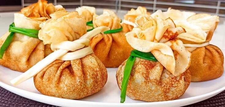 Pancakes with cheese and greens: how to serve the dish in an unusual way