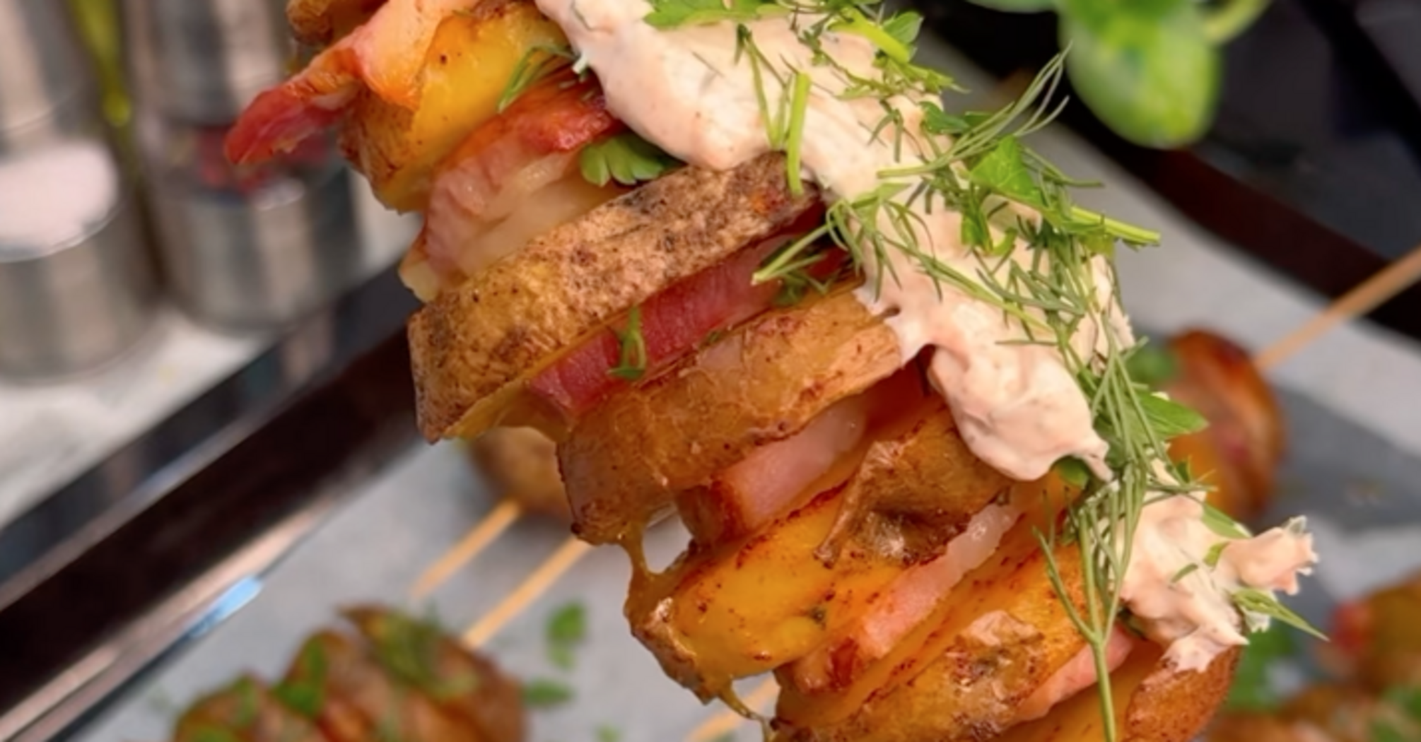 Delicious baked potatoes with bacon