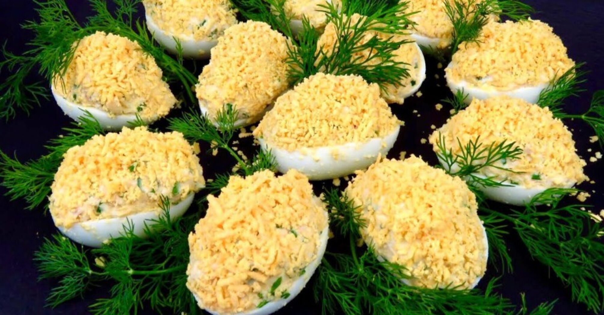 Stuffed eggs 'Mimosa': salad and appetizer at the same time