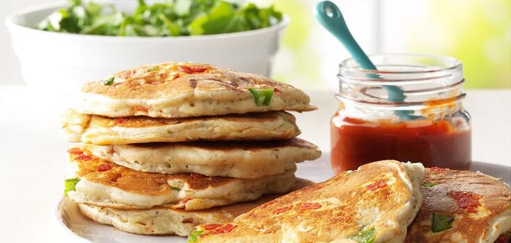 Pancakes and pizza at the same time: how to prepare a versatile dish quickly
