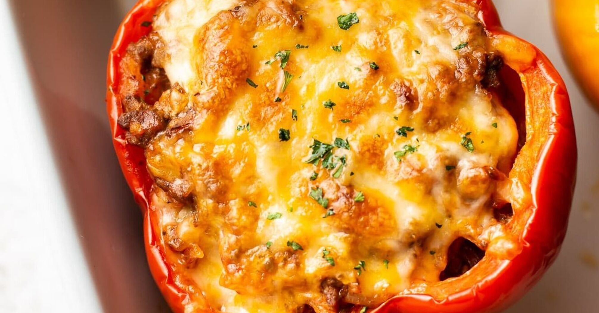 How to bake peppers with filling deliciously