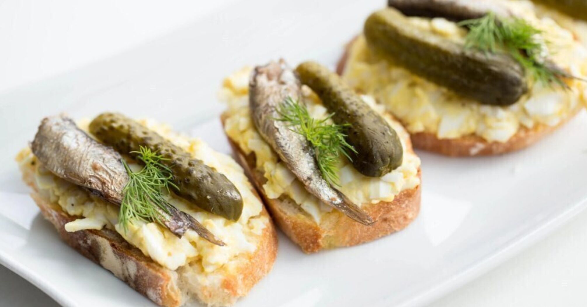 Delicious sandwiches with sprats