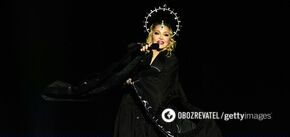 Madonna broke her own record at a concert in Rio de Janeiro and made a spectacular reference to Michael Jackson