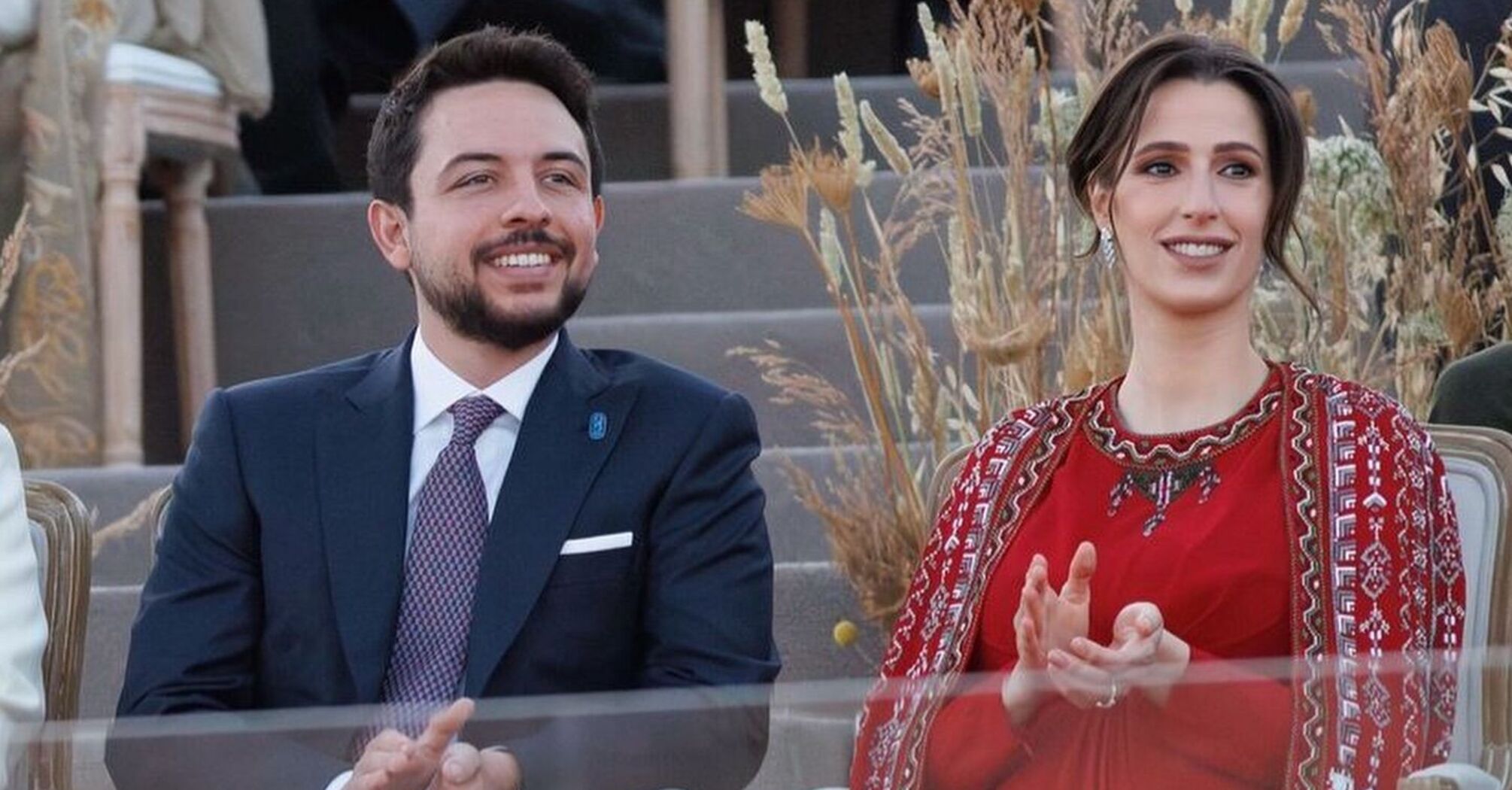 Pregnant Princess Rajwa of Jordan makes a public appearance in her new status for the first time: the stunning red dress was made to order