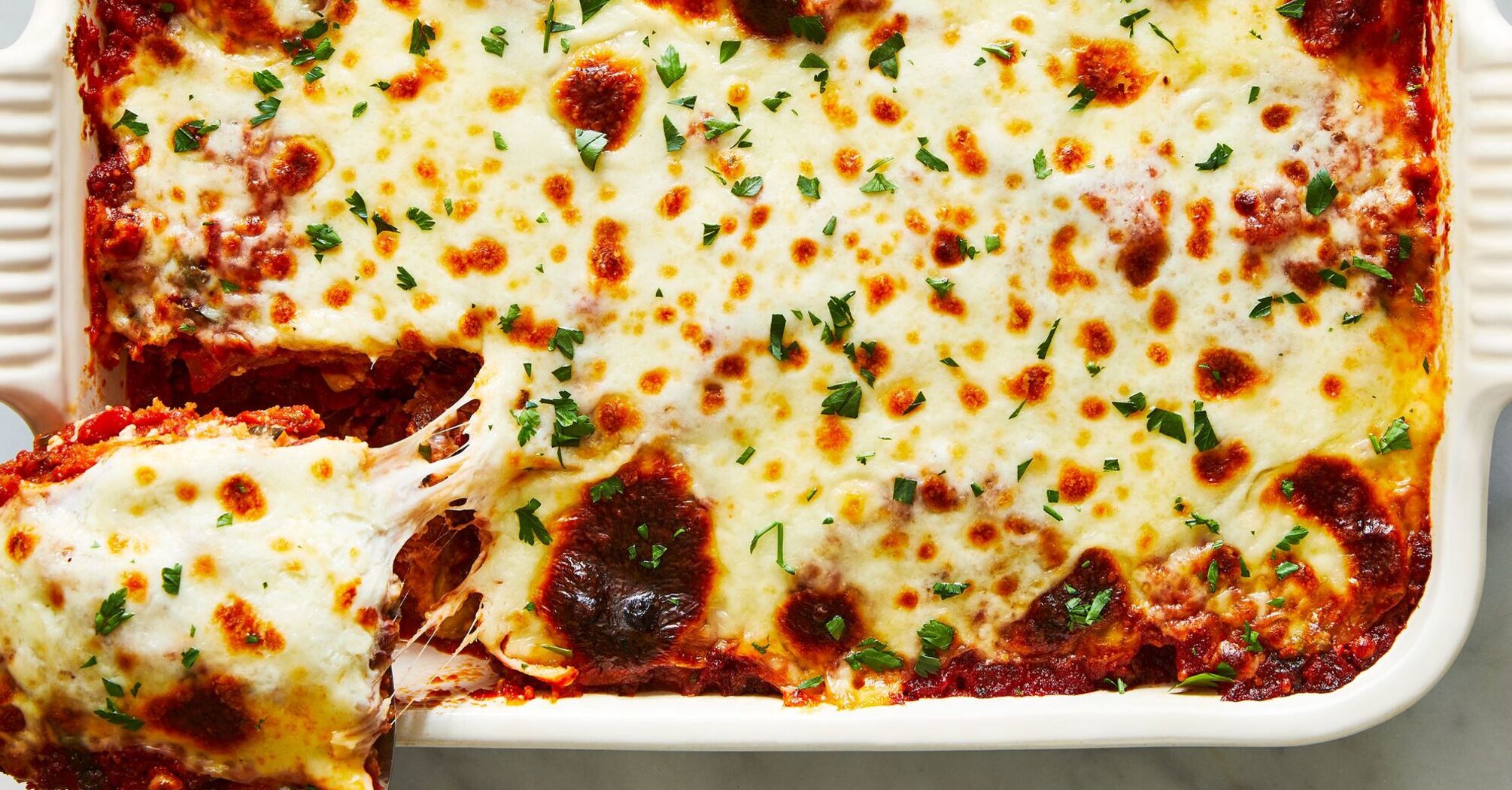 Spicy eggplant parmigiana for a hearty lunch: how to cook a delicious dish