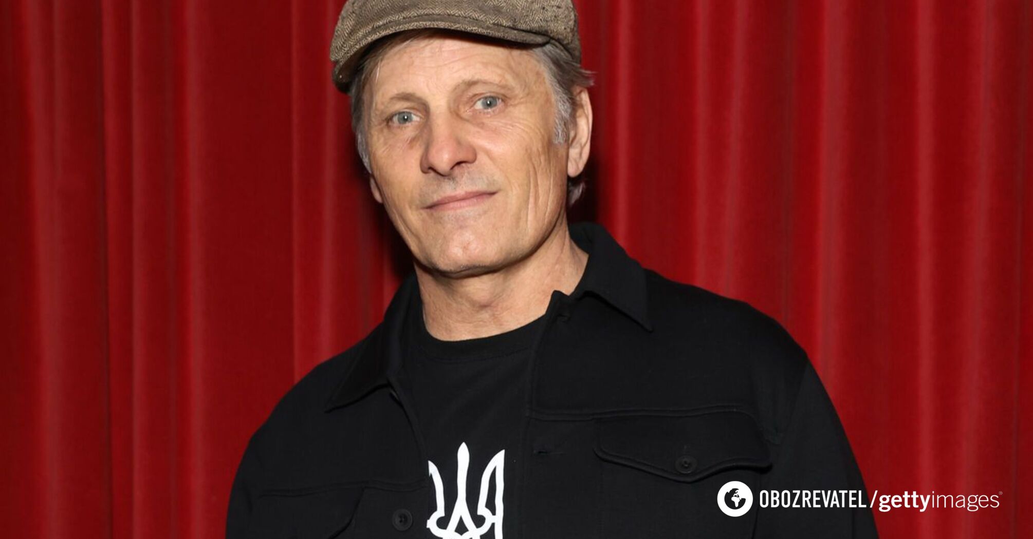 Wearing a T-shirt with a trident and a Ukrainian flag badge on his jacket. Hollywood actor Viggo Mortensen arrived in Chernivtsi