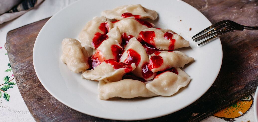 Delicious steamed dumplings with cherries and strawberries