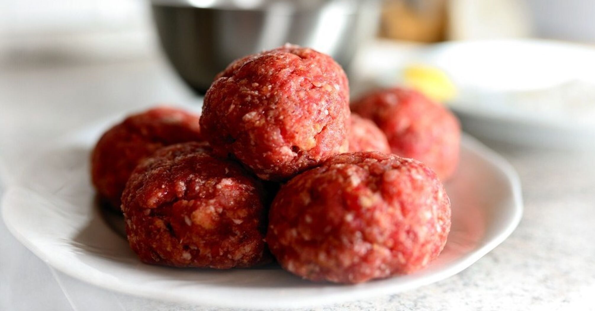 What other ingredients can be added to meatballs besides eggs so that they hold their shape well