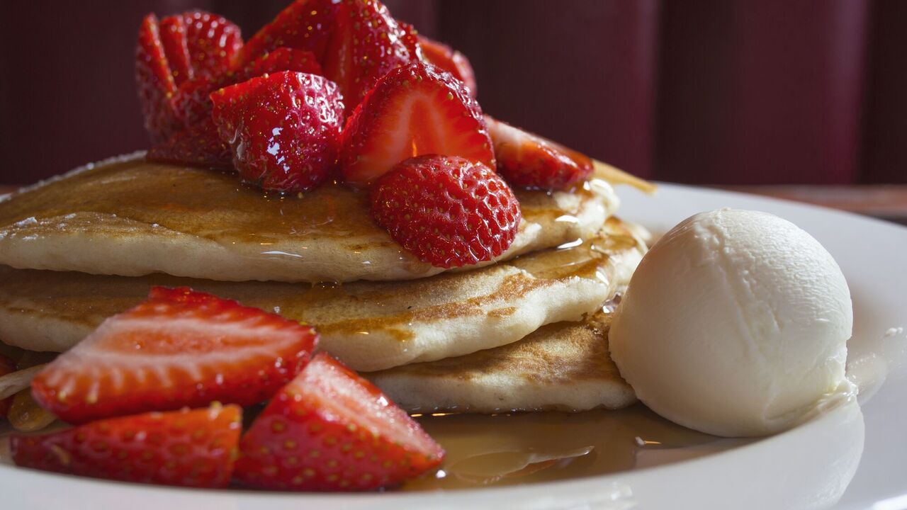 Pancakes with strawberries and ice cream