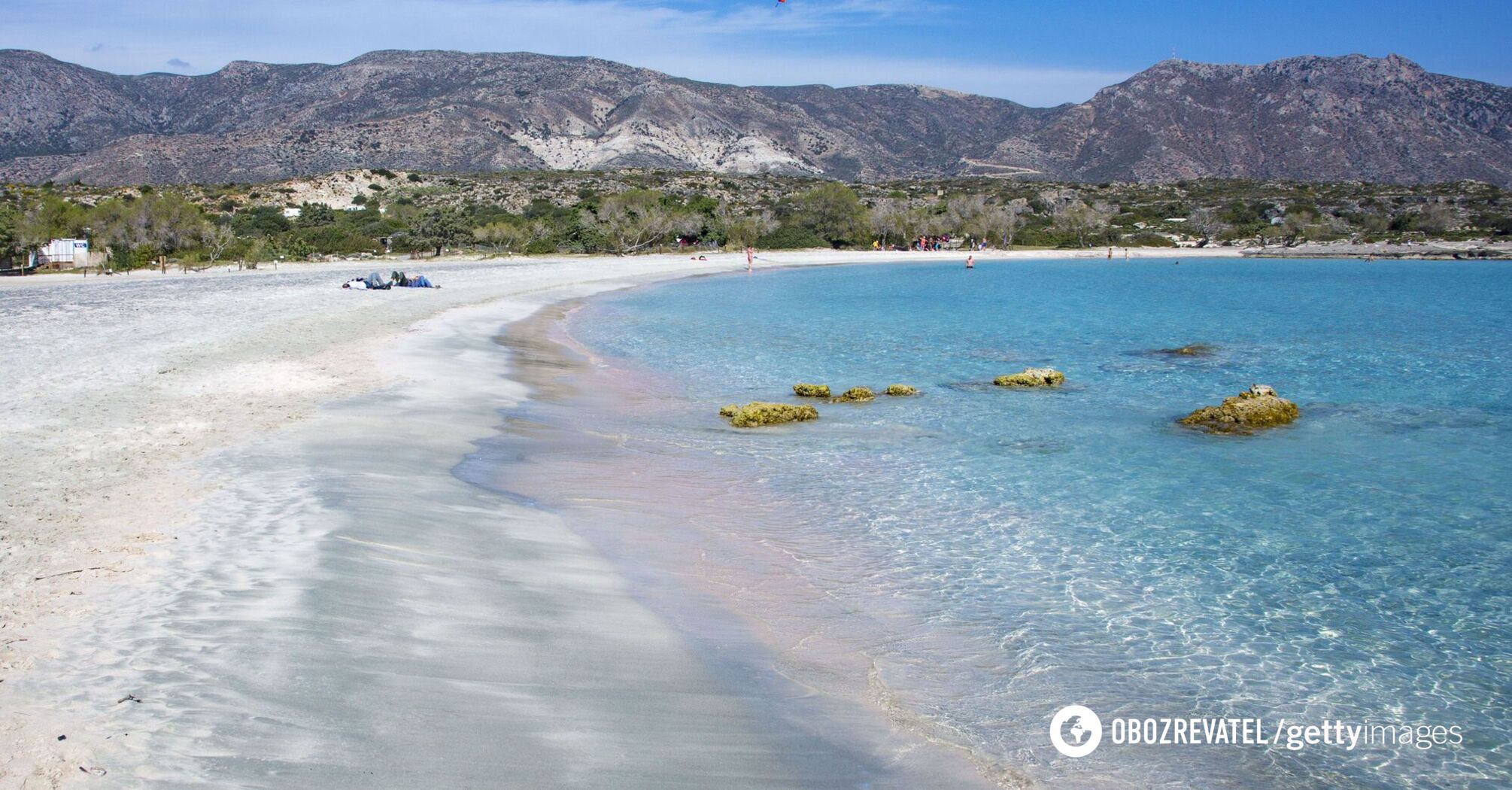 Pink sand and turquoise sea. A remote Greek beach was named one of the best in Europe
