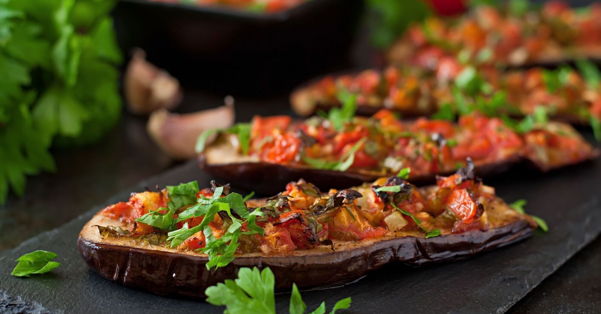 Tastier than chops: baked eggplant in French, with cheese and tomatoes
