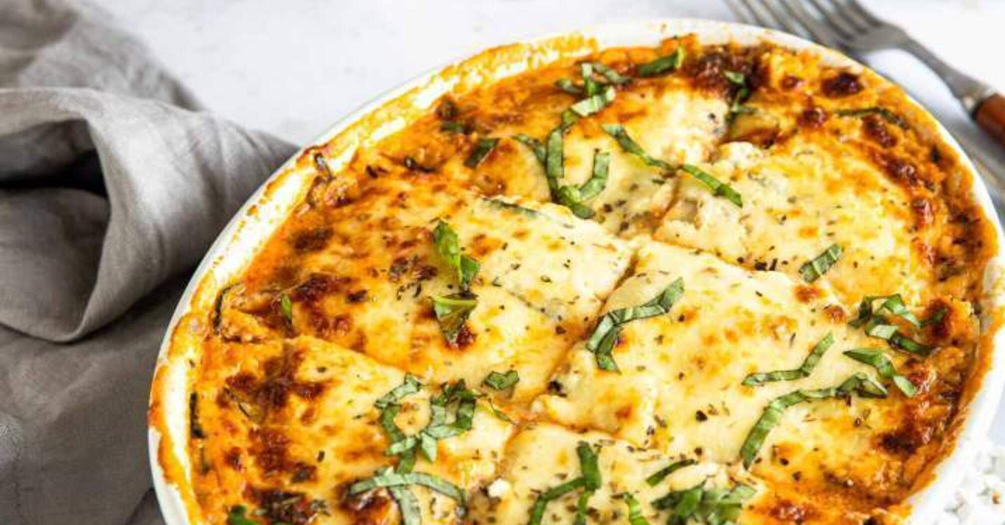 Zucchini casserole with cheese and tomatoes: baked in just 20 minutes