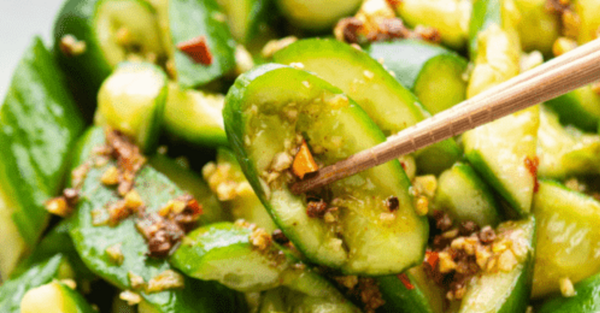 Crispy smashed cucumbers with onions and greens: you can eat in 30 minutes