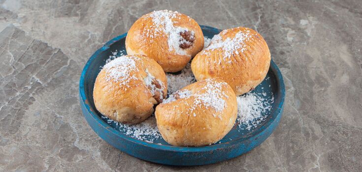 Puffy stuffed donuts: how to prepare the perfect condensed milk cream
