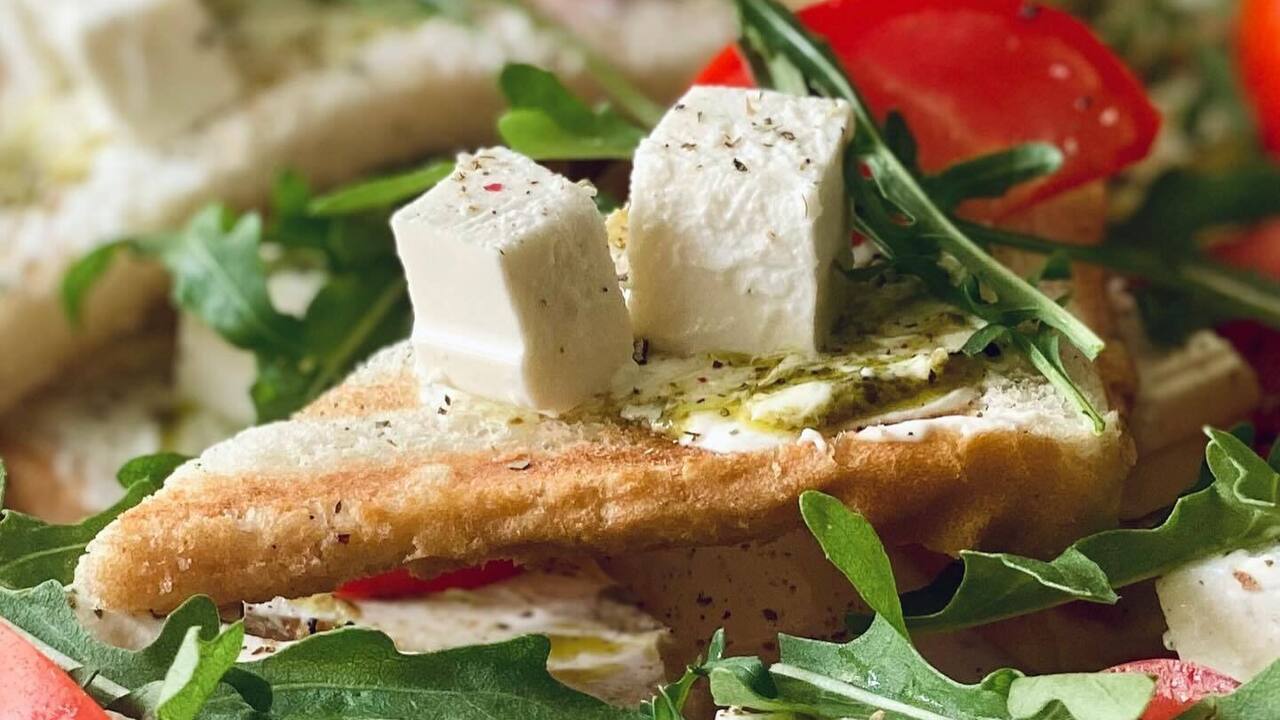 Instead of usual sandwiches: summer bruschetta with cheese and vegetables