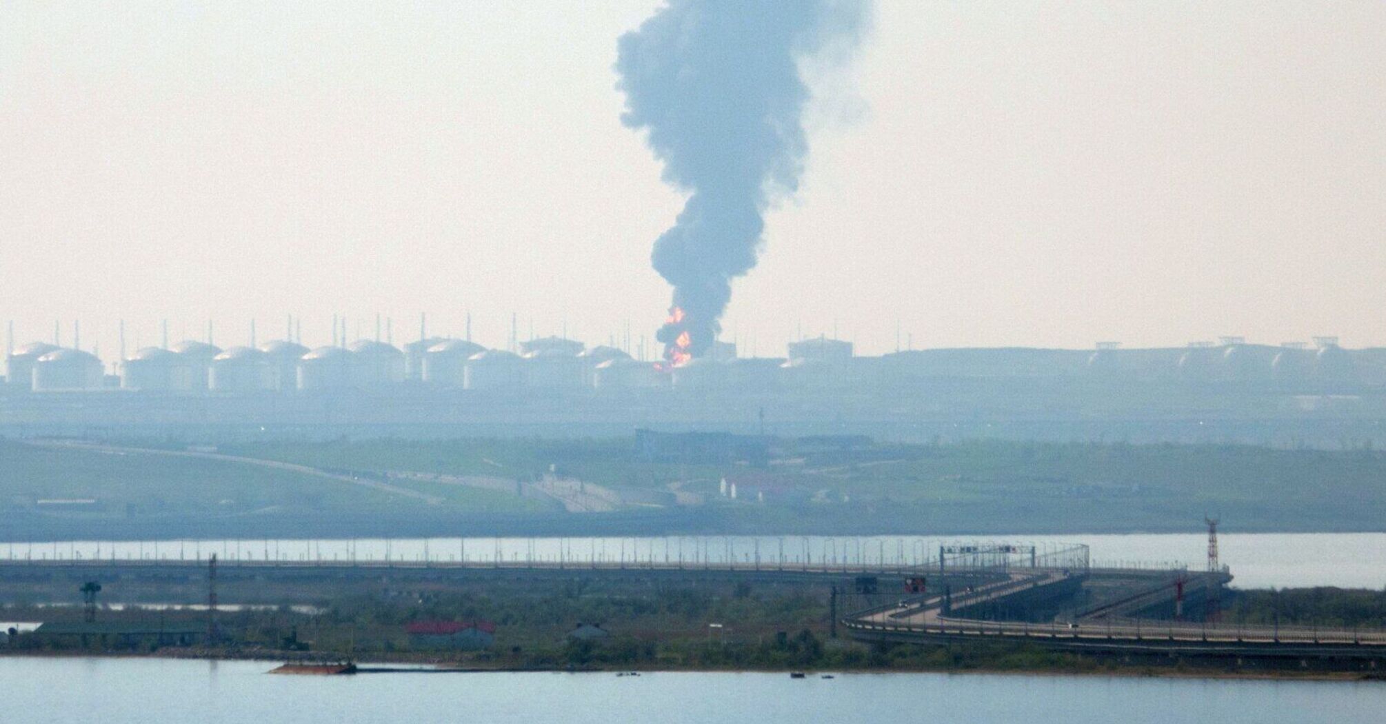 Explosions and smoke rise in occupied Crimea