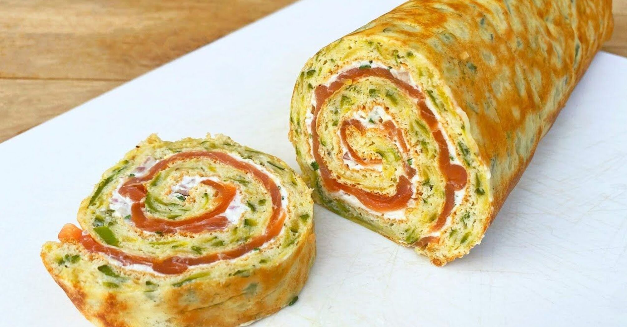Zucchini roll with cream cheese and red fish: how to prepare the dough to keep its shape
