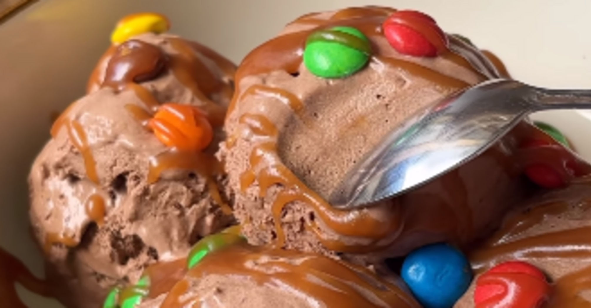 Homemade chocolate ice cream with salted caramel and M&M's