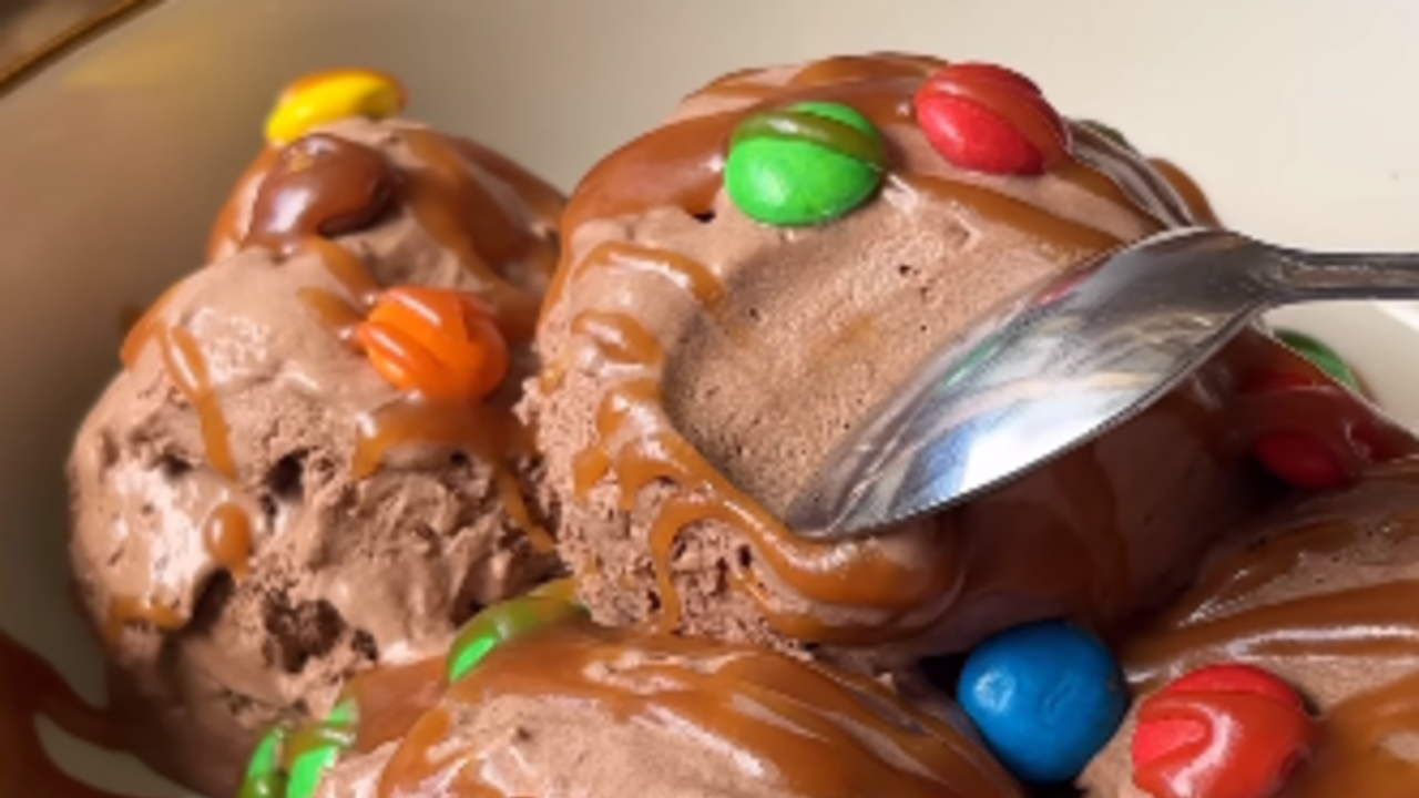 Homemade chocolate ice cream with salted caramel and M&M's