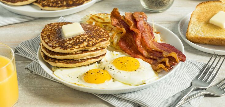 Potato pancakes with egg and bacon
