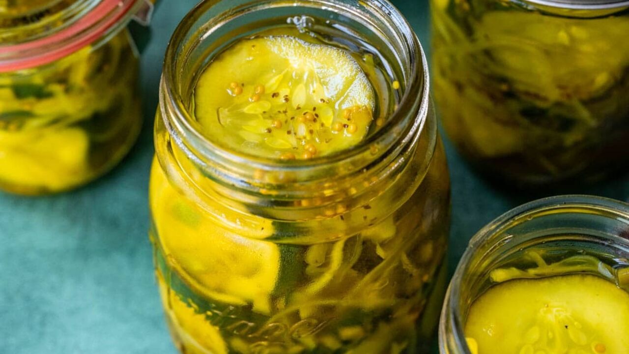 Spicy cucumbers for the winter in Dijon mustard: how to cut vegetables