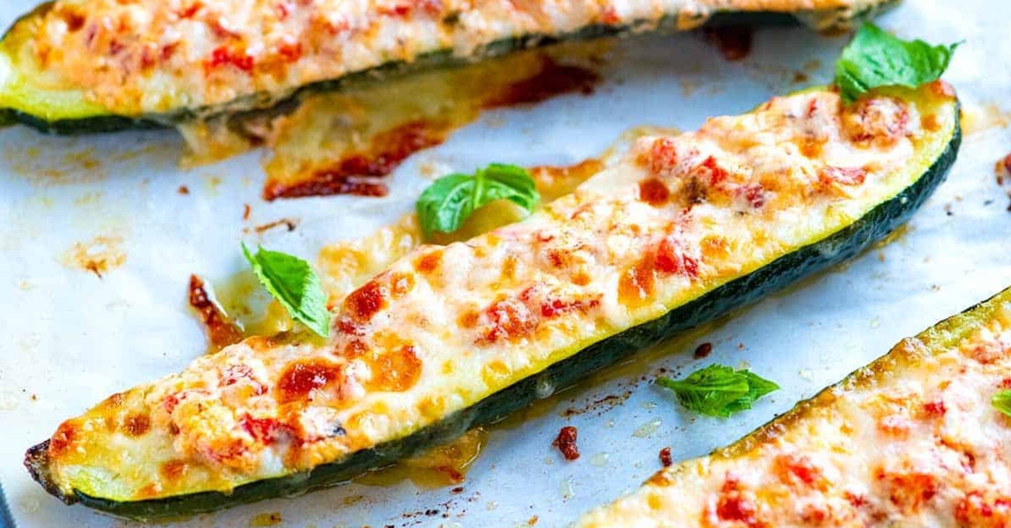 Stuffed zucchini with cheese: very quickly baked in the oven