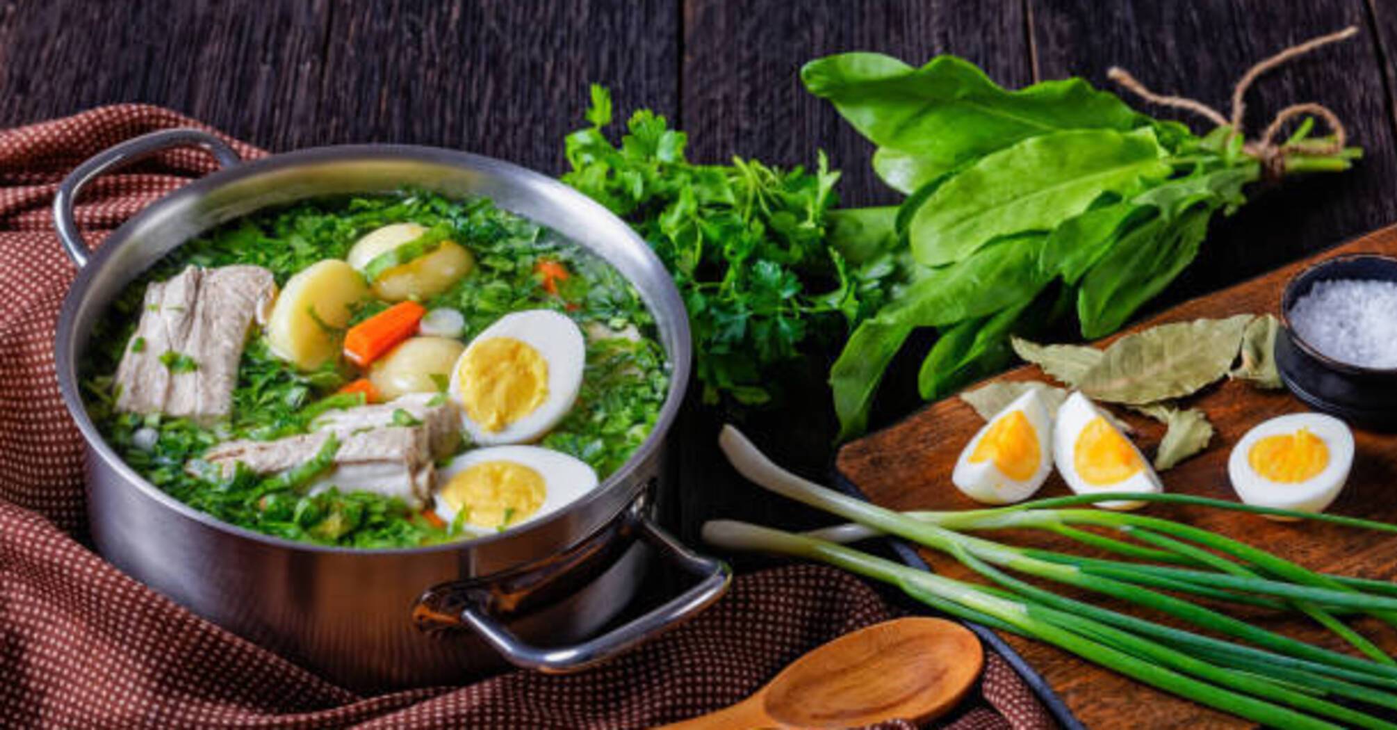 Homemade green borscht with spinach