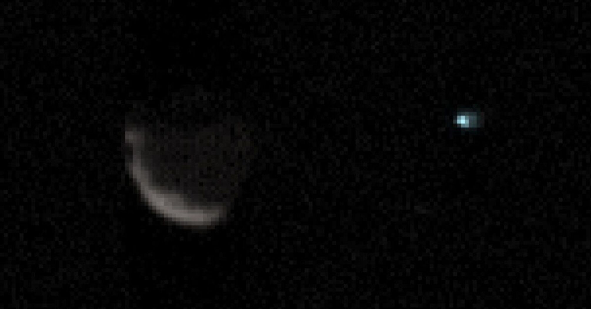 We're just a dot: NASA's Mars rover has photographed Phobos and Earth together for the first time. Photo.