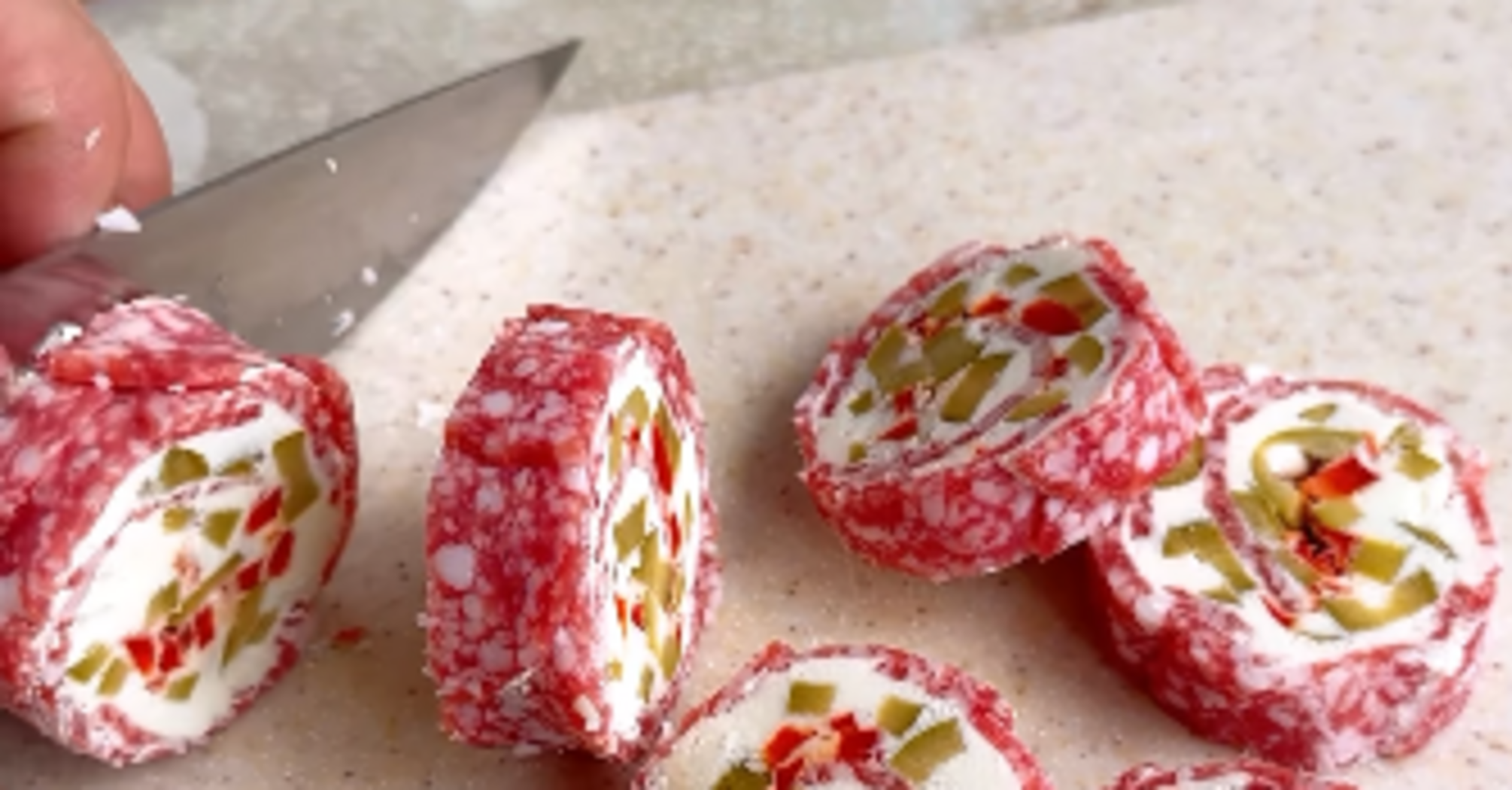 Salami roll: a quick and delicious appetizer for a festive table