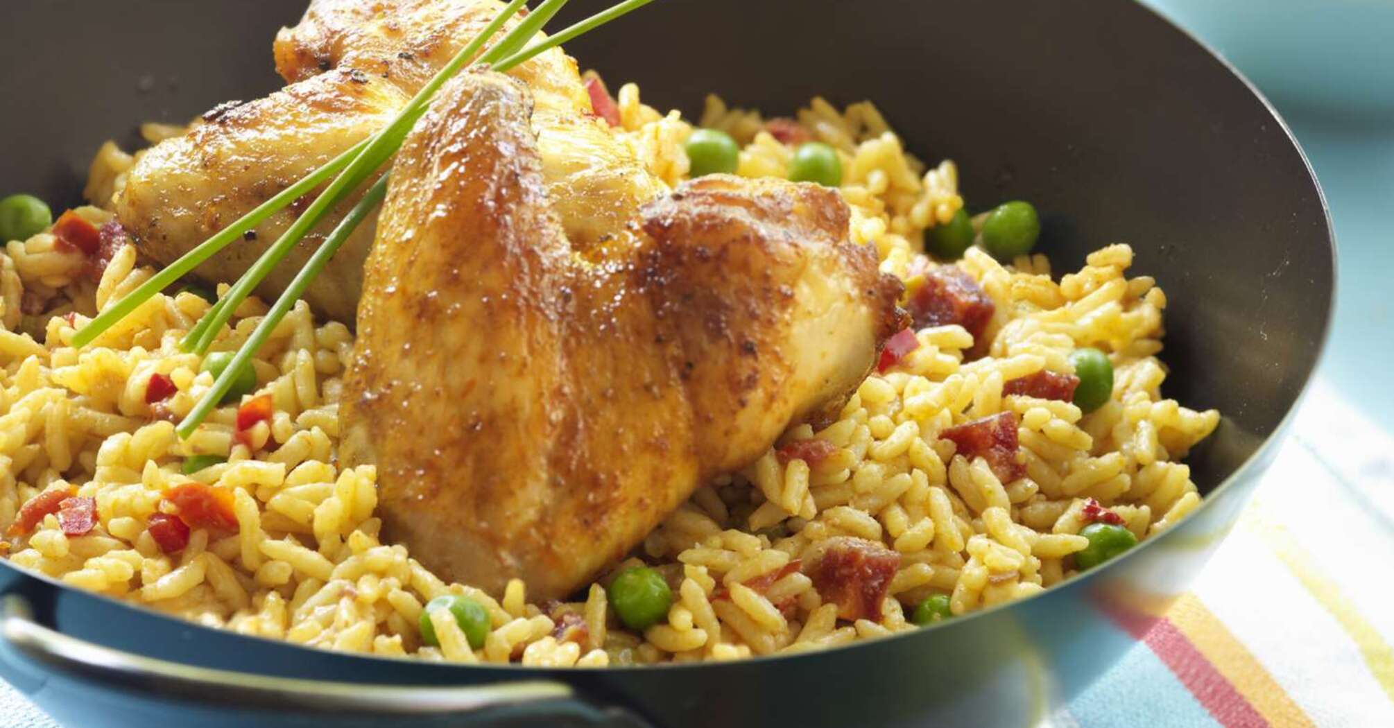 Meat and side dish in one meal: how to cook delicious rice with chicken and vegetables for lunch