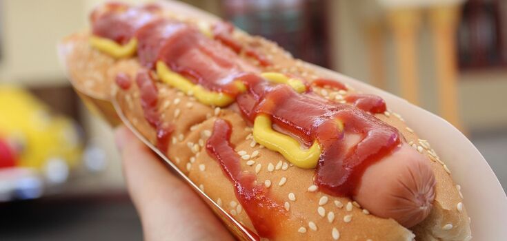 History of hot dogs and the best topping options