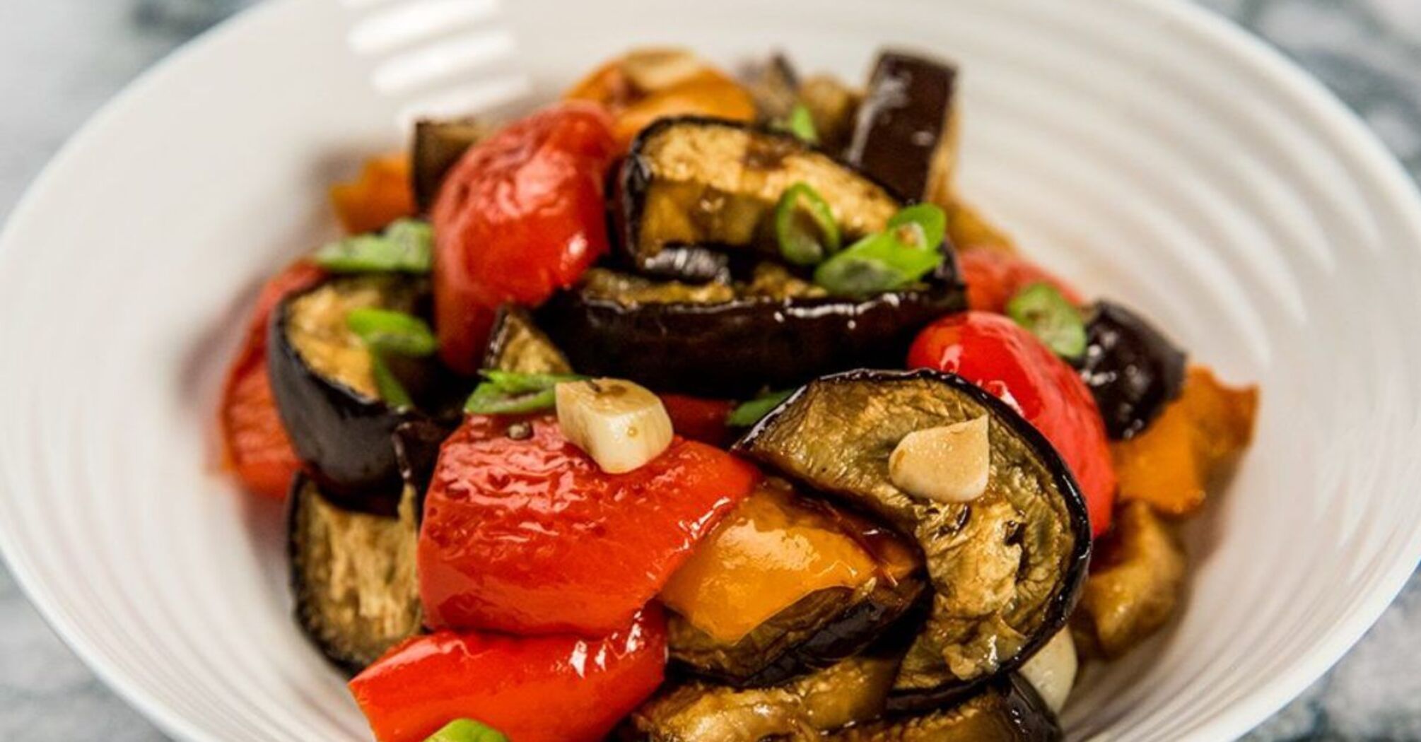 Eggplant and pepper salad appetizer: cooked with a delicious sauce