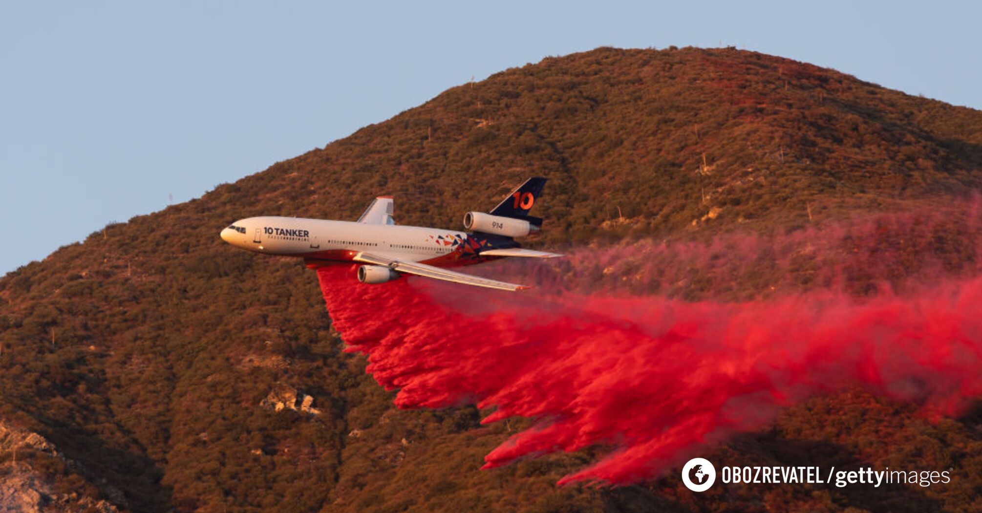 What kind of pink powder is being sprayed over California and how it helps fight wildfires