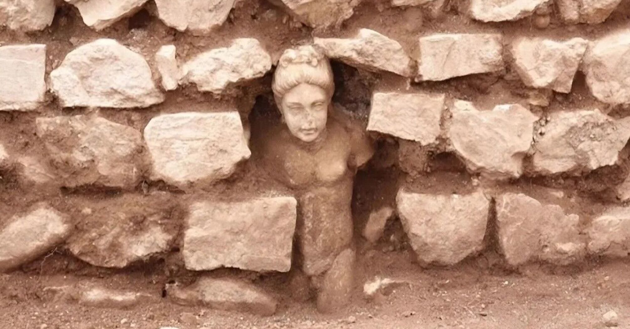 A young man in the wall. A unique find was discovered on the ruins of the ancient city of Philippi