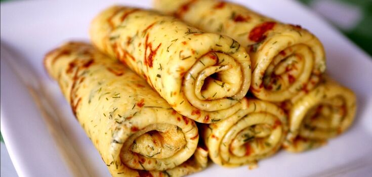 Simple pancakes with cheese and greens: how to prepare a hearty dish in minutes